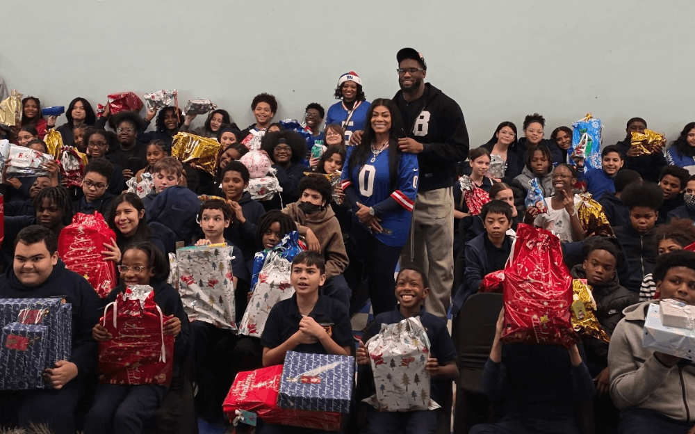 New York Giants Pro Bowler Brian Burns Brings Holiday Joy to Students at Community School - PS 34
